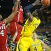 Michigan freshman Glenn Robinson III looks to shoot around North Carolina State senior T.J. Warren and senior C.J. Leslie during the second half at Crisler Center on Tuesday night. Melanie Maxwell I AnnArbor.com